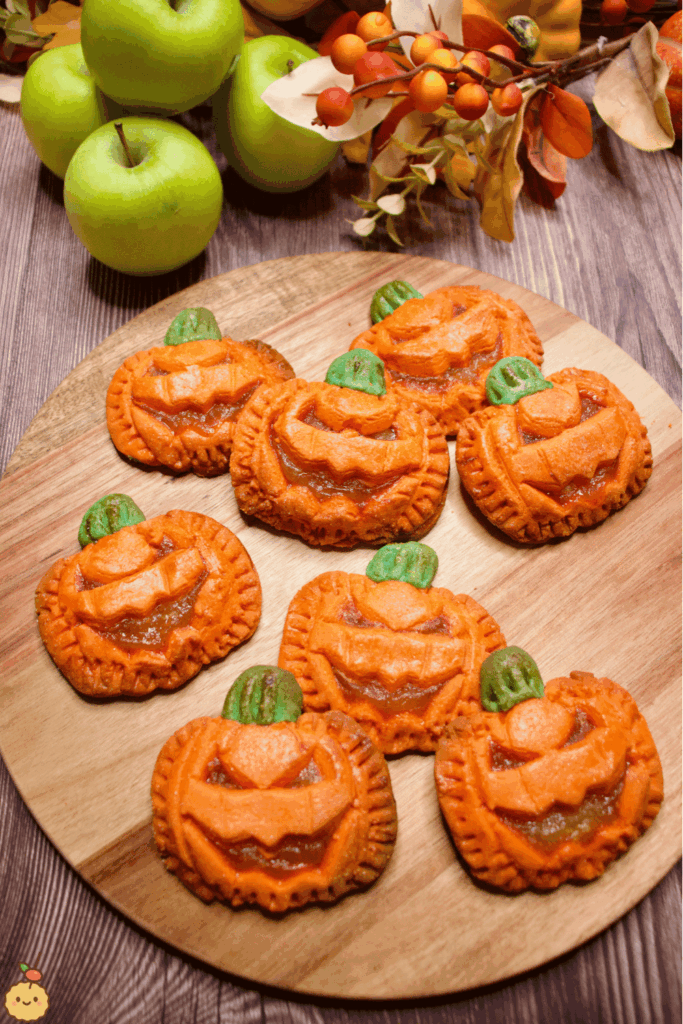 Mini pumpkin hand pies with golden crust – cozy fall appetizers or desserts