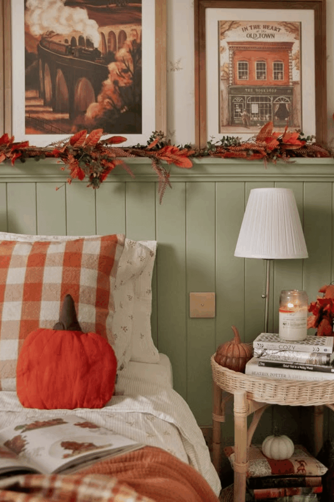 Bedside table decorated with pumpkin spice candle and fall sign