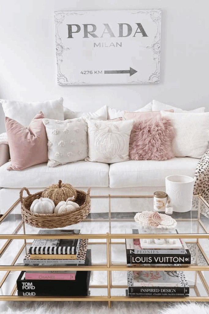 Chic fall coffee table styling with pale pumpkins and soft blush tones