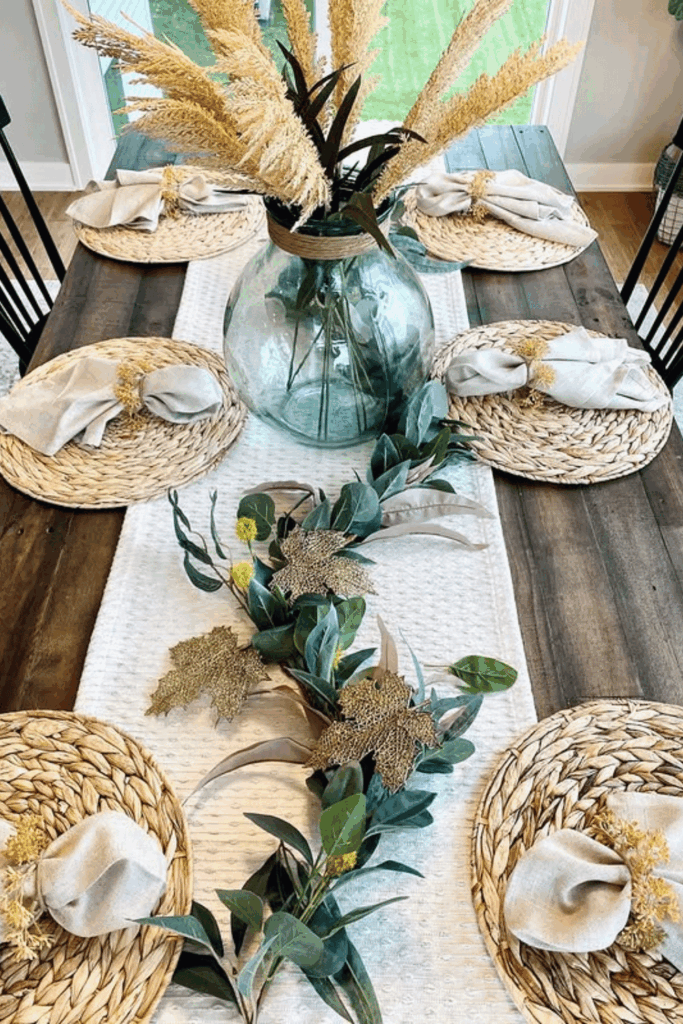 Pampas grass and candles styled on a simple fall table runner