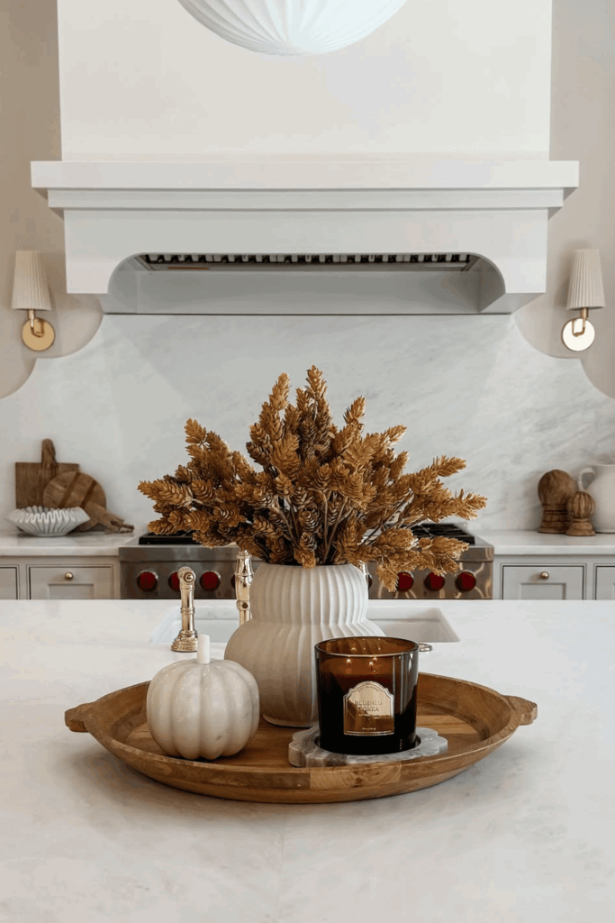 Minimal fall table centerpiece with white branches and neutral tones