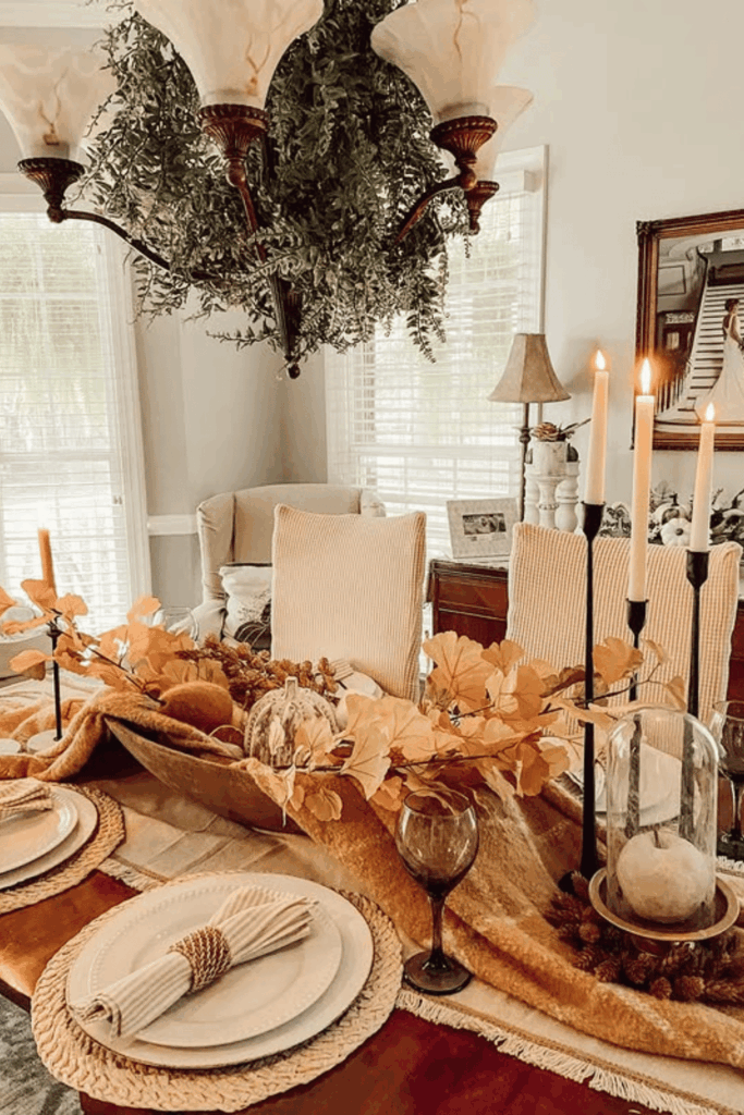 Dough bowl centerpiece with pumpkins, branches, and pinecones