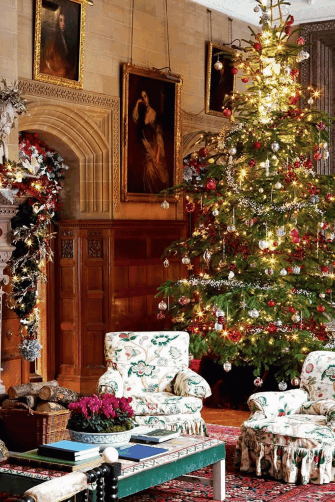 Traditional red and gold Christmas tree in a classic living room with white lights
