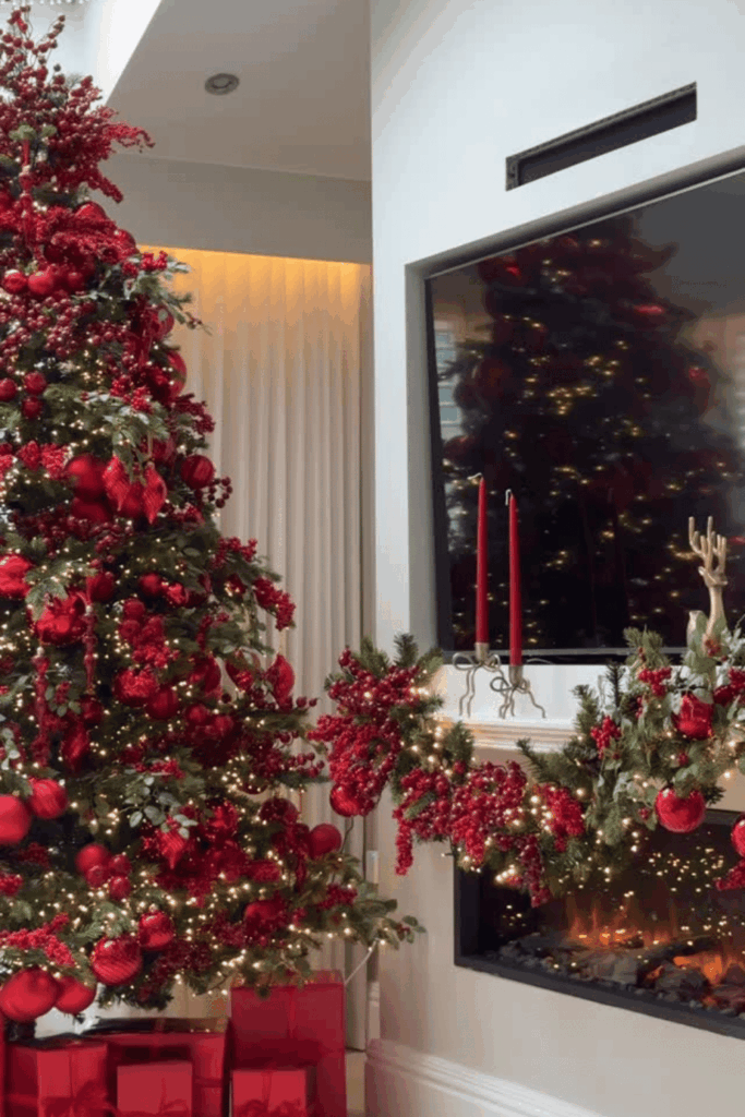 Red Christmas tree decorated entirely in red ornaments and flowers