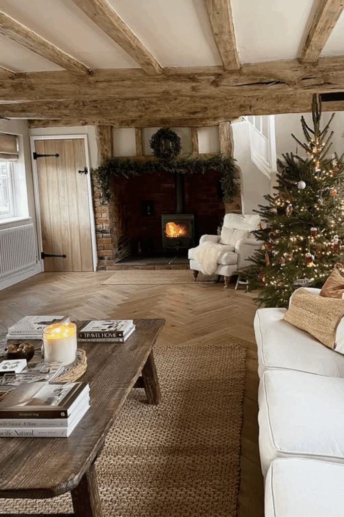Rustic living room with exposed beams and simple Christmas decorations