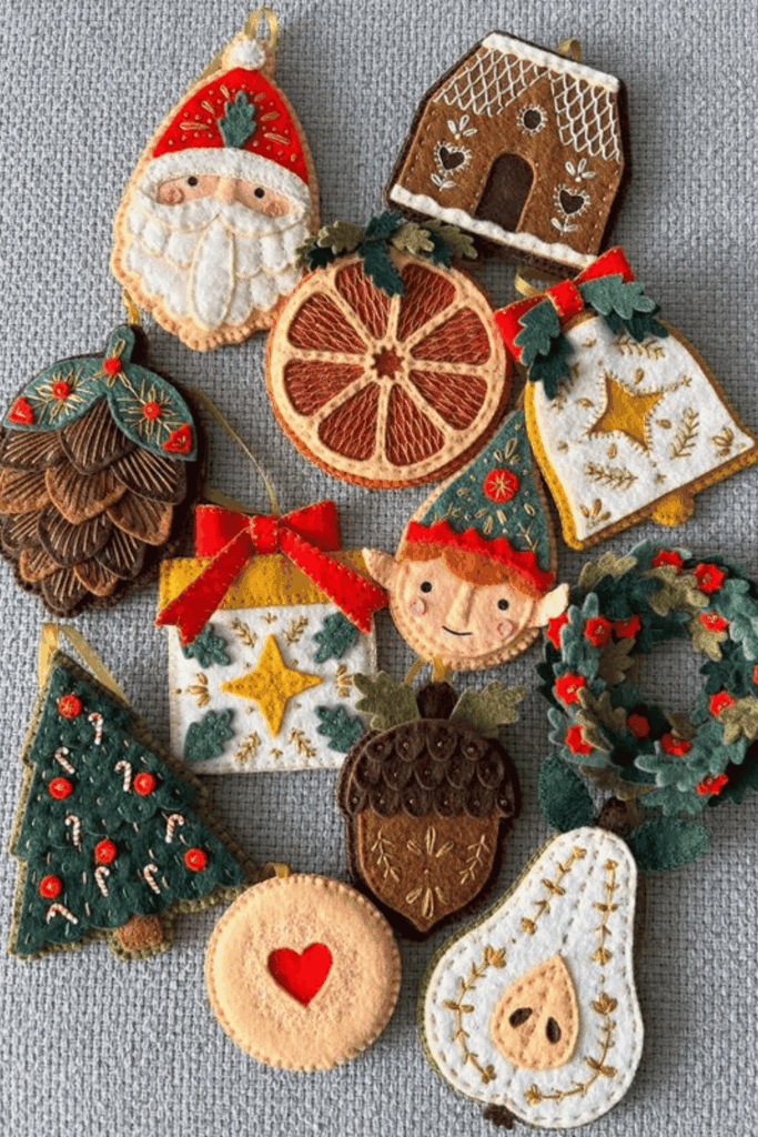 Detailed embroidered felt ornaments including Santa, elf, wreath, and pinecone