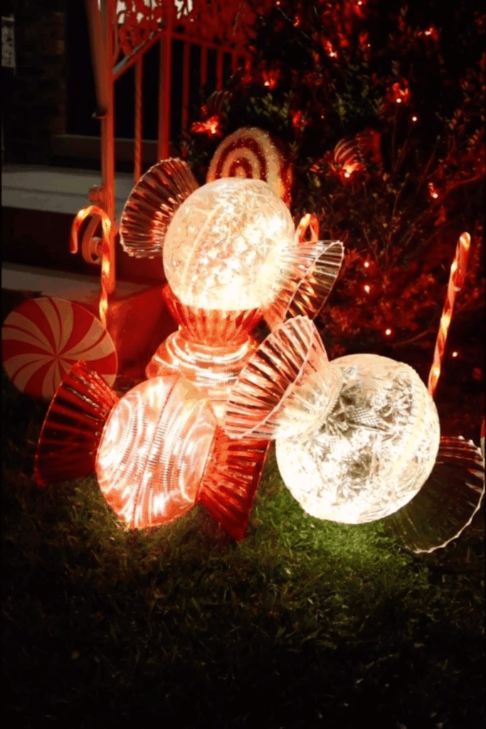 Oversized peppermint and candy lights outdoor Christmas display