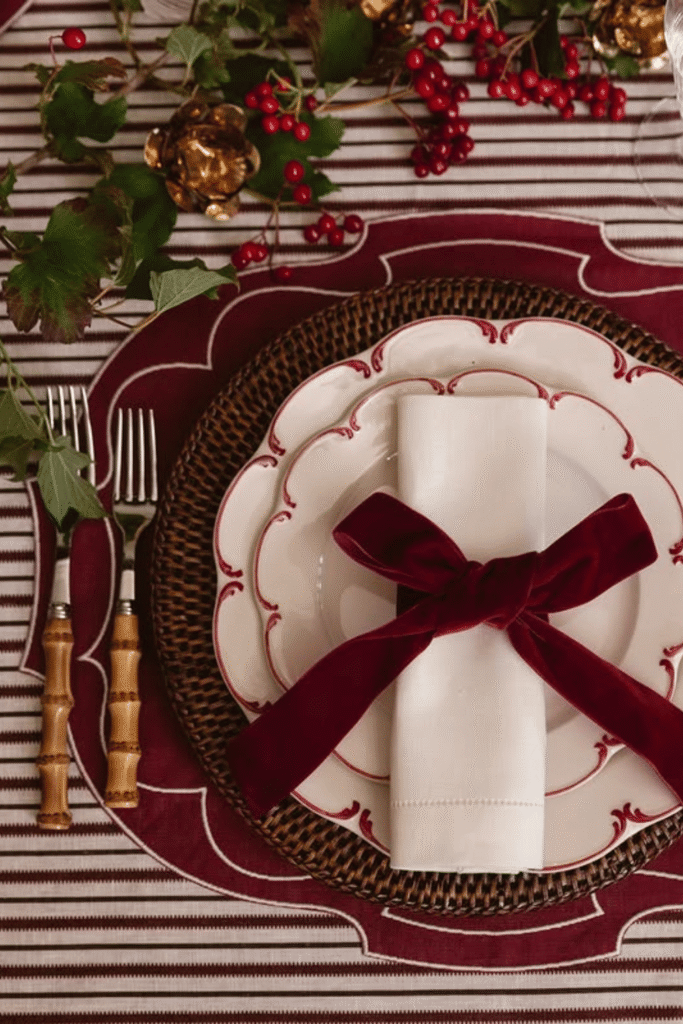 White plates with velvet napkin rings for a classic Christmas table setting