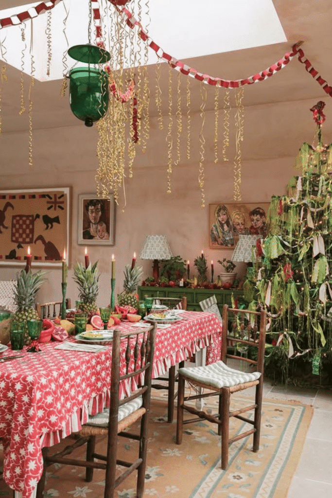 Colorful holiday centerpiece with patterned tablecloth and festive decorations