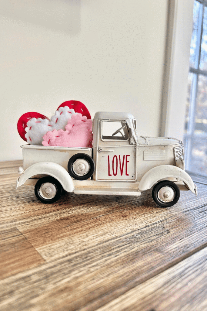 Vintage white love truck Valentine decor with felt hearts