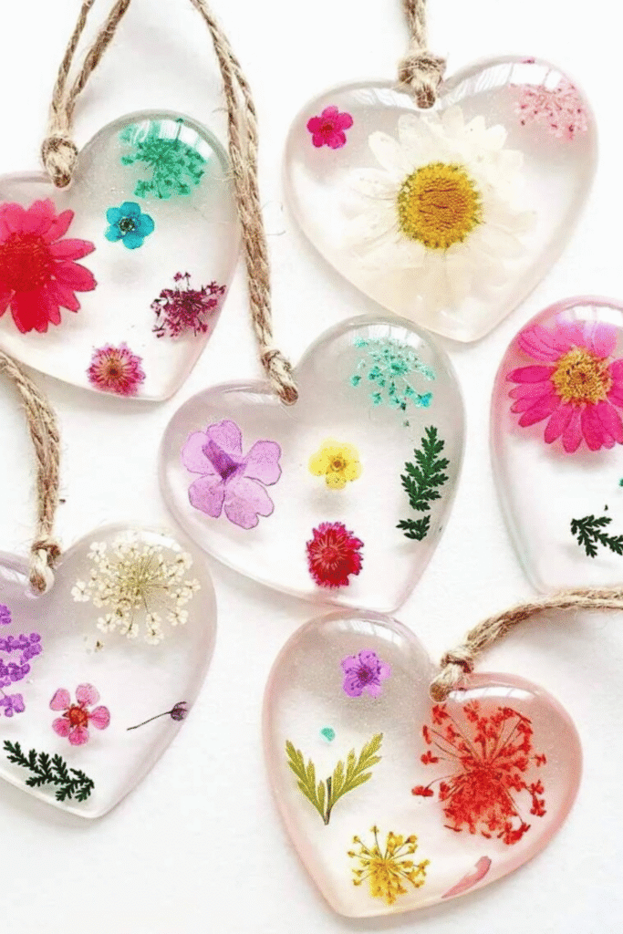 Pressed flower resin heart ornaments with dried florals