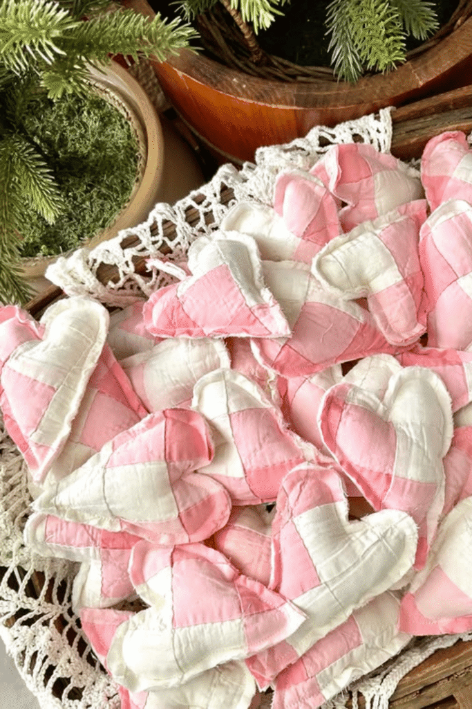 Fabric heart decorations styled in a rustic Valentine’s Day display