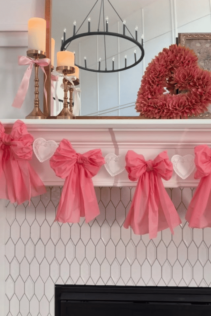Valentine’s Day mantel decor with pink bows and heart accents